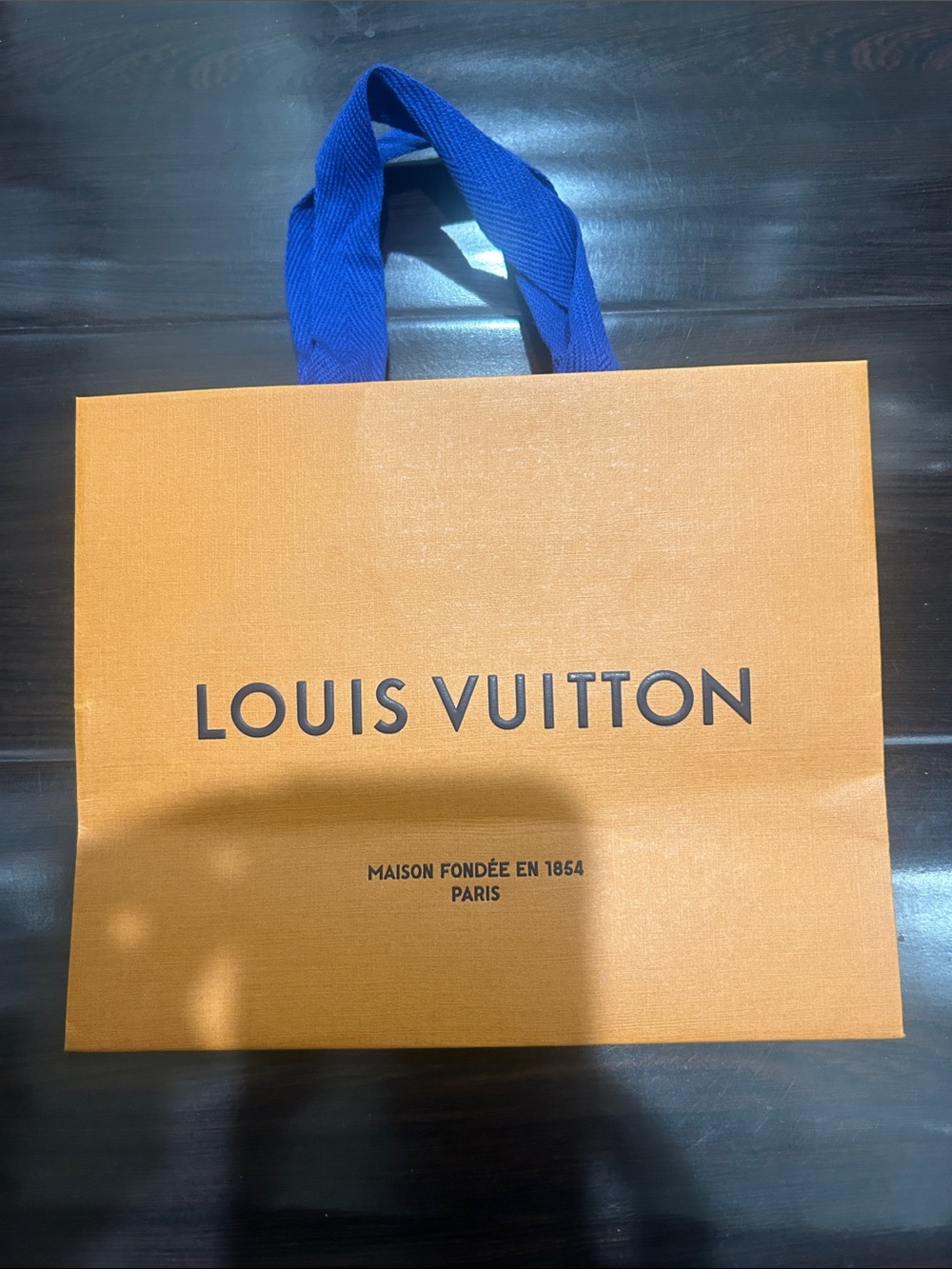 Louis Vuitton Orange Shopping Bag with Blue Handles